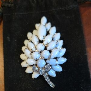 Elegant White Brooch with Silver Accents